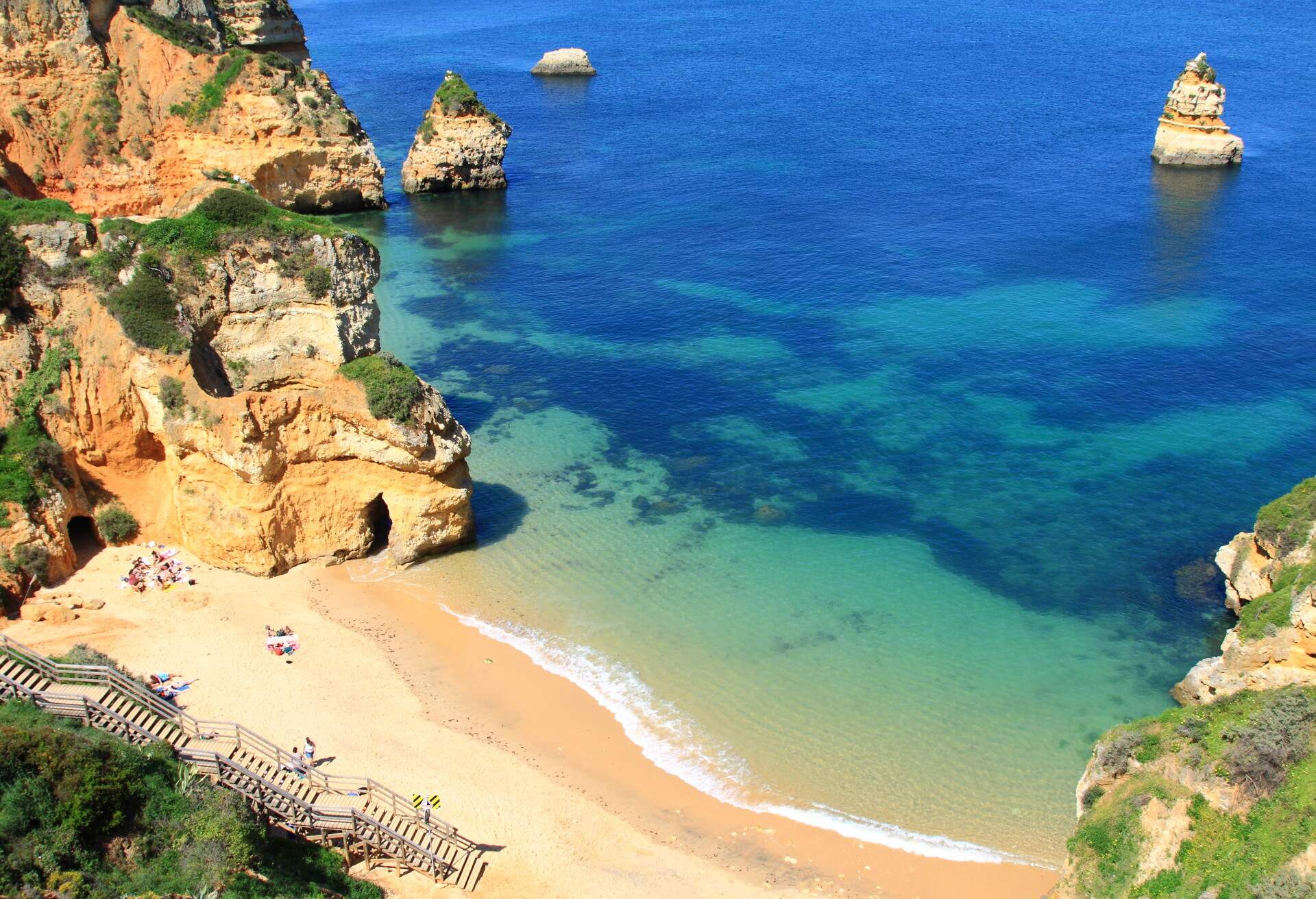 Rocky cliffs on the coast of the Atlantic ocean in Lagos, Algarve, Portugal; Shutterstock ID 155038679