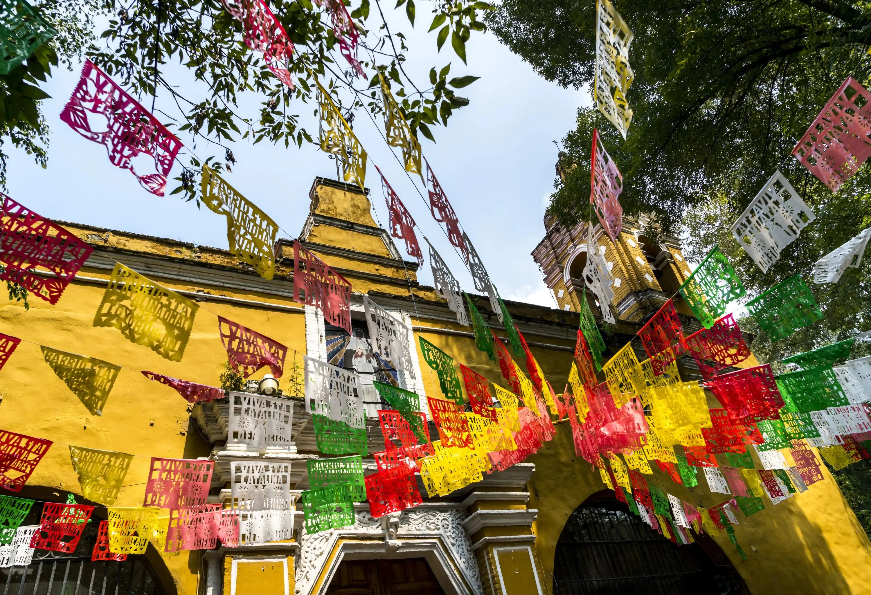 Colourful paper banners hung outside the church.