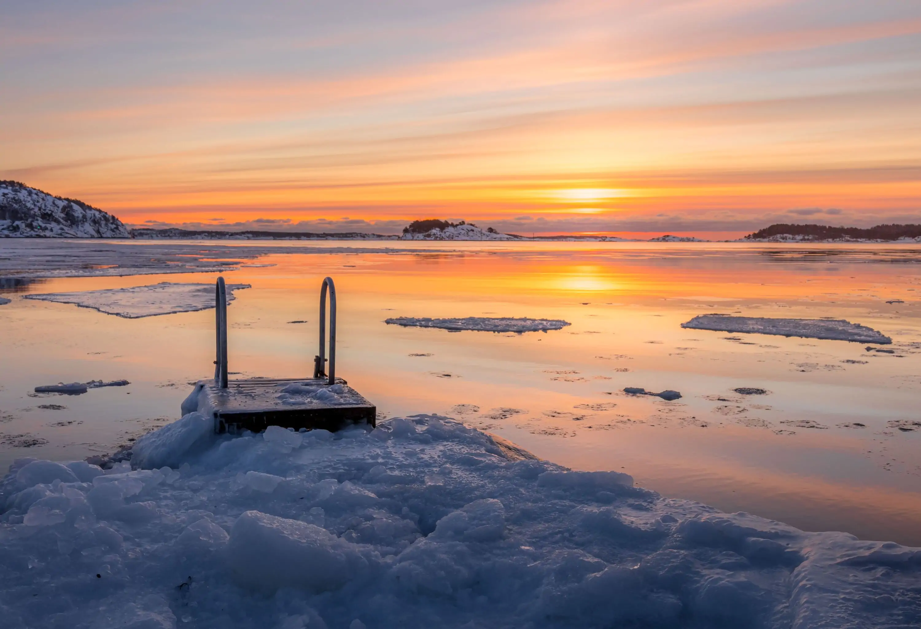 Location for ice swimming. Shot early in the morning with rising sun.