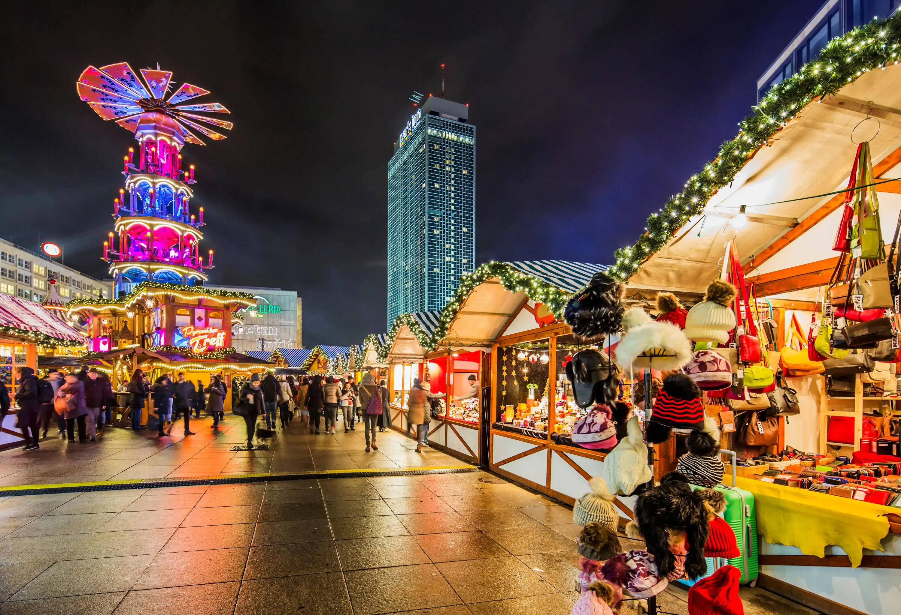 Germany, Berlin, Berlin . Alexanderplatz Christmas Market, on the background the Interhotel Stadt Berlin now Park Hotel