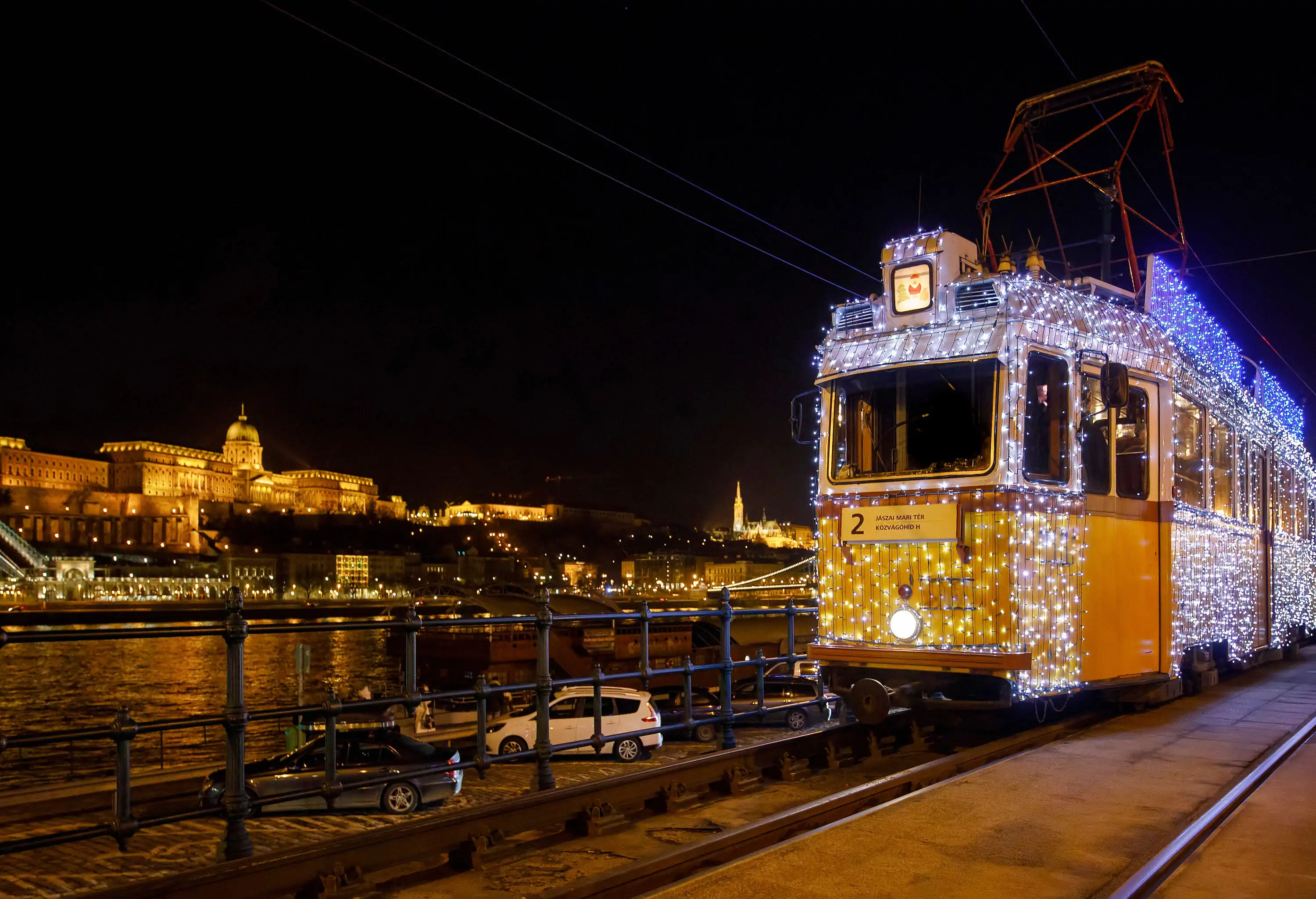 A tram embellished with fairy lights.