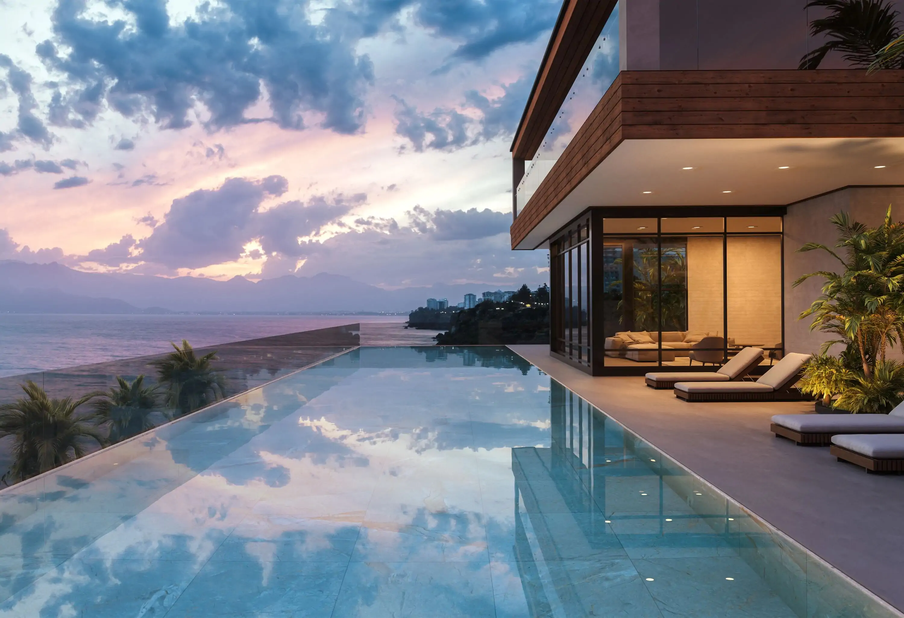 Luxury modern house with swimming pool and beautiful sea view at dusk.