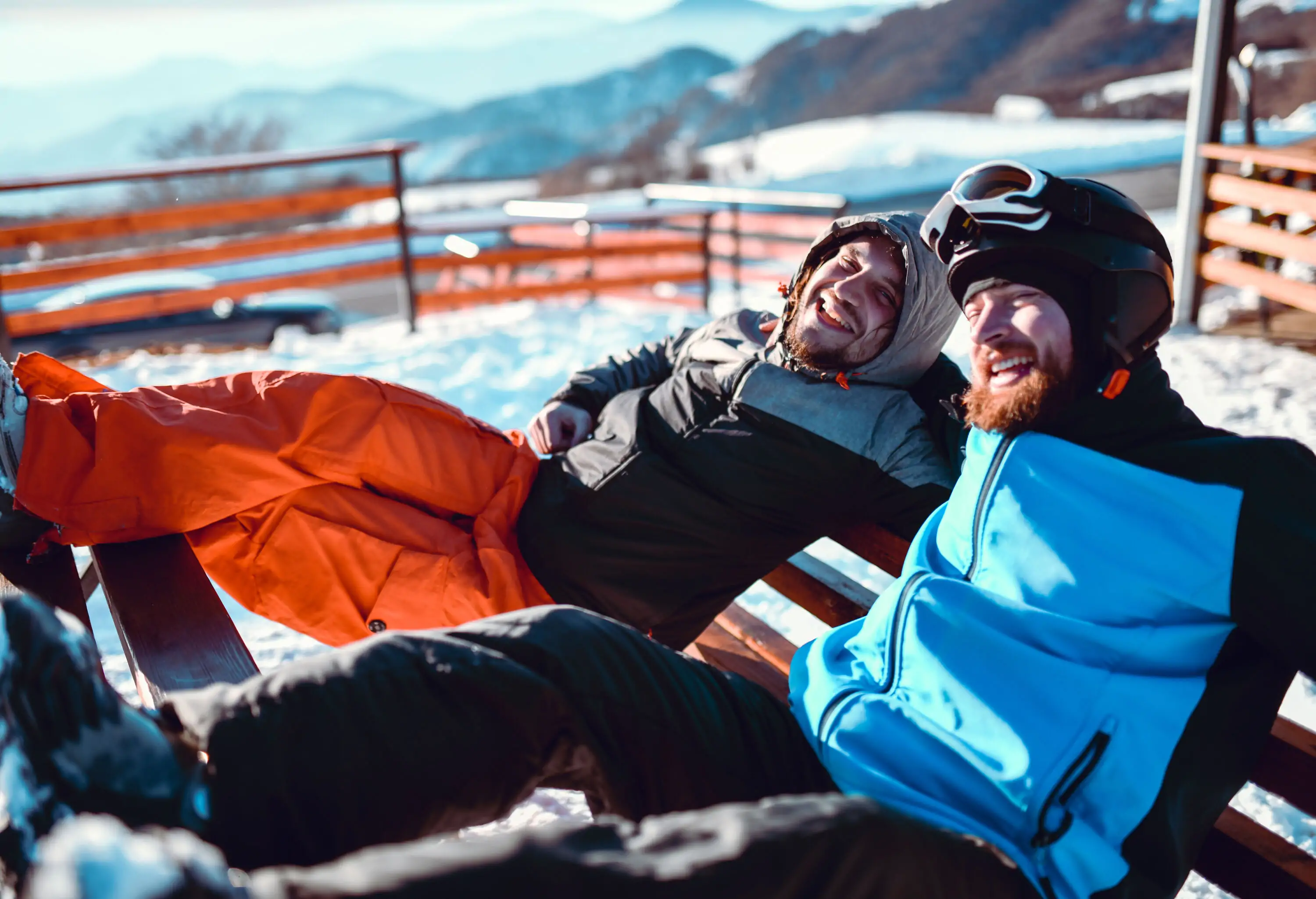 Two men laughing at After Skiing On Mountain